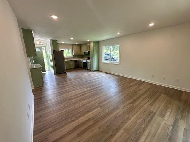 807 Poplar Dr, Centerville, TN 37033 - unfurnished living room with dark wood-style floors, recessed lighting, and baseboards