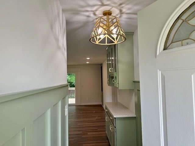 807 Poplar Dr, Centerville, TN 37033 - corridor with a chandelier, dark wood finished floors, and baseboards