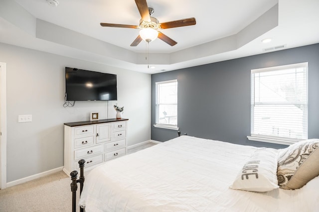 1110 Colonel Reuben Searcy Ct, Murfreesboro, TN 37129 - bedroom featuring baseboards, light colored carpet, a ceiling fan, and a tray ceiling
