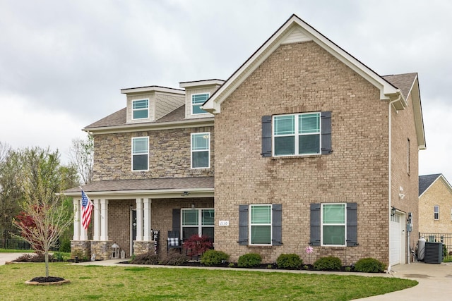 1110 Colonel Reuben Searcy Ct, Murfreesboro, TN 37129 - craftsman inspired home with a front yard, central air condition unit, a garage, and concrete driveway