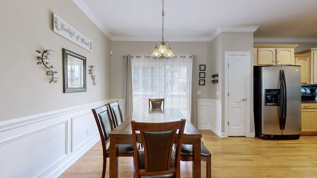 4015 Sleepyhollow Way, Mount Juliet, TN 37122 - dining area with plenty of natural light, a chandelier, crown molding, a decorative wall, and light wood finished floors