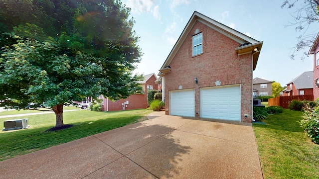 4015 Sleepyhollow Way, Mount Juliet, TN 37122 - view of home's exterior with an attached garage, brick siding, a yard, and concrete driveway