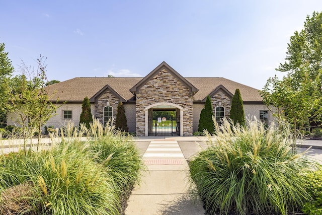 4015 Sleepyhollow Way, Mount Juliet, TN 37122 - french country home with stone siding and roof with shingles