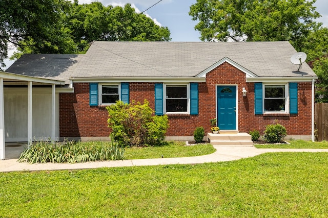 102 Lyle Ln, Nashville, TN 37210 - view of front of home with brick siding and roof with shingles