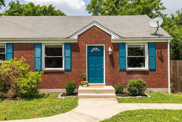 102 Lyle Ln, Nashville, TN 37210 - bungalow-style home with brick siding and roof with shingles