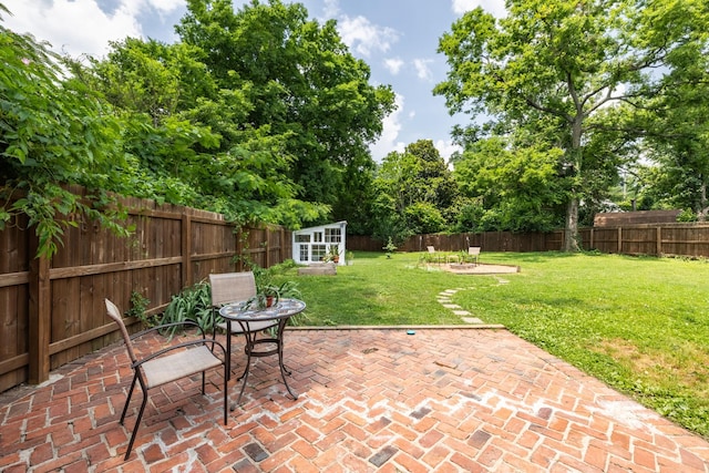 102 Lyle Ln, Nashville, TN 37210 - view of patio featuring an outbuilding