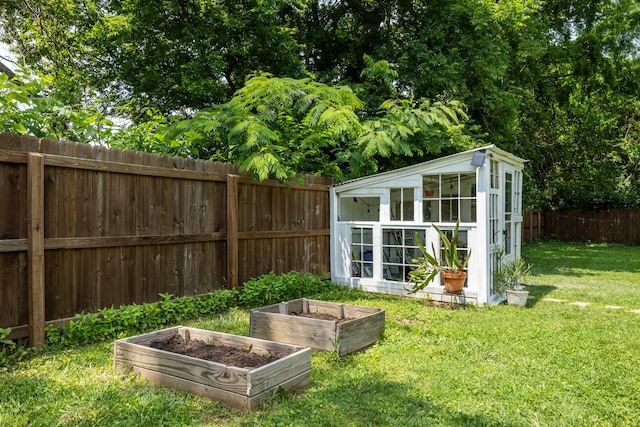 102 Lyle Ln, Nashville, TN 37210 - view of outbuilding with a vegetable garden