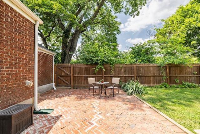 102 Lyle Ln, Nashville, TN 37210 - view of patio / terrace featuring outdoor dining area and a gate