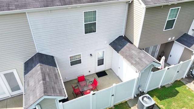 2541 Jackalope St, Murfreesboro, TN 37130 - back of house with a shingled roof, central AC unit, a patio area, and a fenced backyard