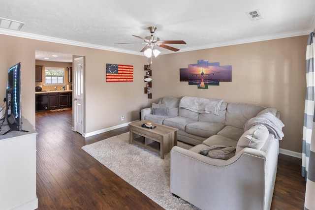 2541 Jackalope St, Murfreesboro, TN 37130 - living area with dark wood-style flooring, ceiling fan, ornamental molding, and baseboards