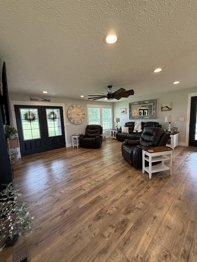 285 Shrum Ln, Lafayette, TN 37083 - living area with a textured ceiling, hardwood / wood-style floors, recessed lighting, a ceiling fan, and baseboards