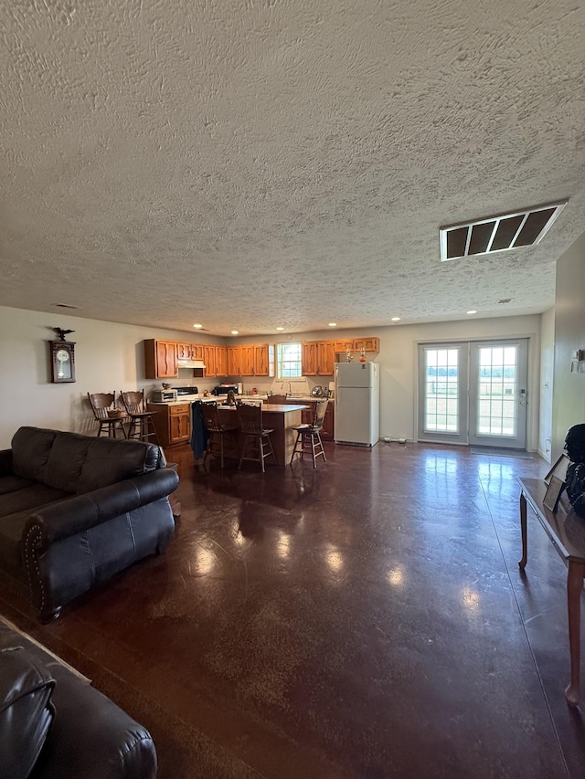 285 Shrum Ln, Lafayette, TN 37083 - living area featuring a textured ceiling