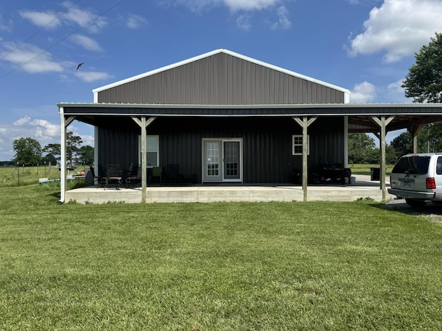 285 Shrum Ln, Lafayette, TN 37083 - rear view of property featuring a yard and a carport