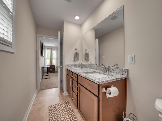 201 Quarry Overlook Way, Clarksville, TN 37043 - bathroom with double vanity, baseboards, and tile patterned floors