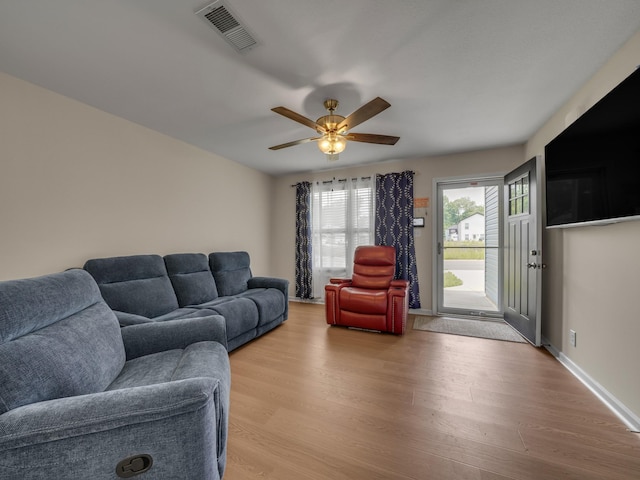 201 Quarry Overlook Way, Clarksville, TN 37043 - living area featuring light wood-style flooring, ceiling fan, and baseboards