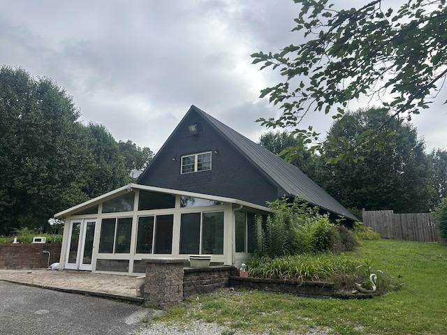 2449 Buffalo Rd, Lawrenceburg, TN 38464 - back of house with a sunroom