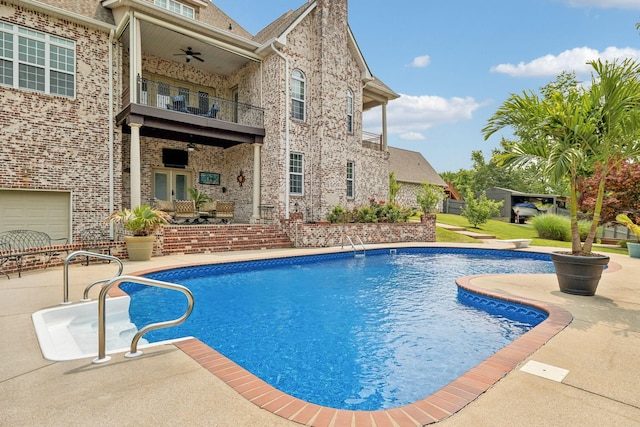 226 Hidden Harbour Dr, Mount Juliet, TN 37122 - outdoor pool with a ceiling fan, a patio, french doors, and a diving board