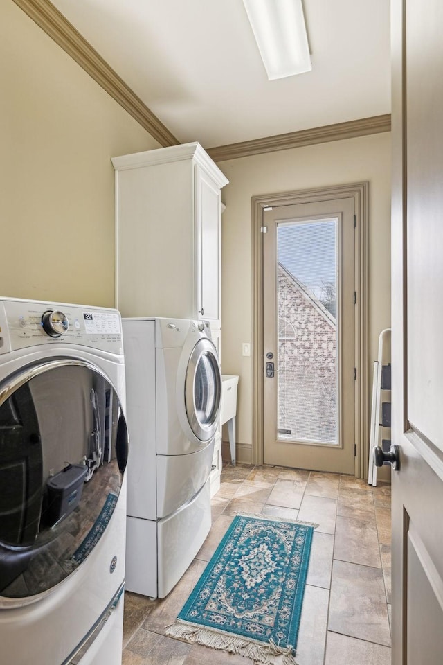 226 Hidden Harbour Dr, Mount Juliet, TN 37122 - washroom featuring washer and dryer, ornamental molding, and cabinet space