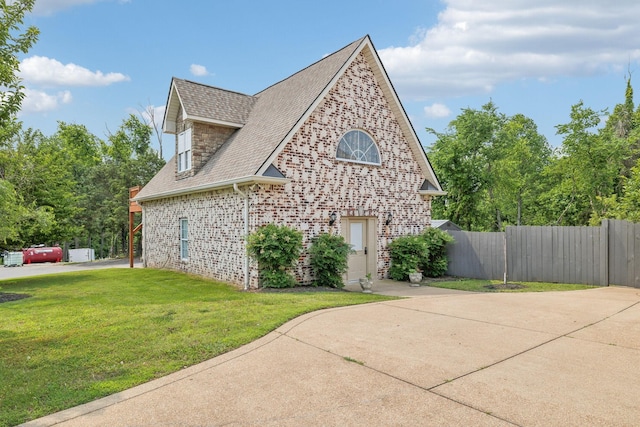 226 Hidden Harbour Dr, Mount Juliet, TN 37122 - view of home's exterior featuring roof with shingles and brick siding