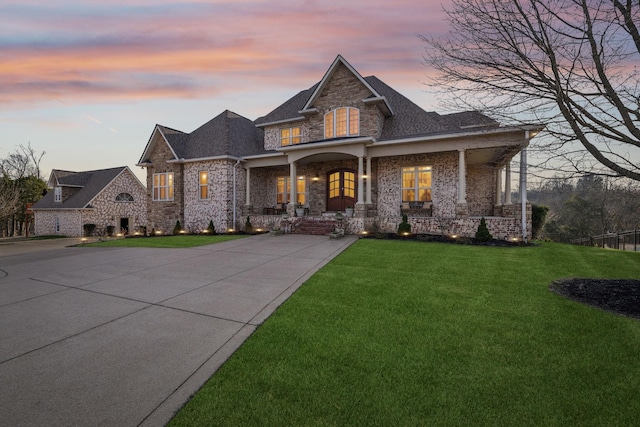 226 Hidden Harbour Dr, Mount Juliet, TN 37122 - view of front of property with a porch, a front lawn, brick siding, and stone siding