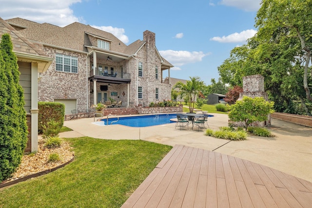 226 Hidden Harbour Dr, Mount Juliet, TN 37122 - swimming pool with a patio area, a yard, ceiling fan, a fireplace, and outdoor dining space