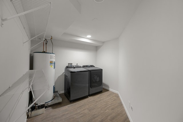 109 Hazelwood Dr, Hendersonville, TN 37075 - washroom featuring separate washer and dryer, water heater, wood finished floors, recessed lighting, and baseboards