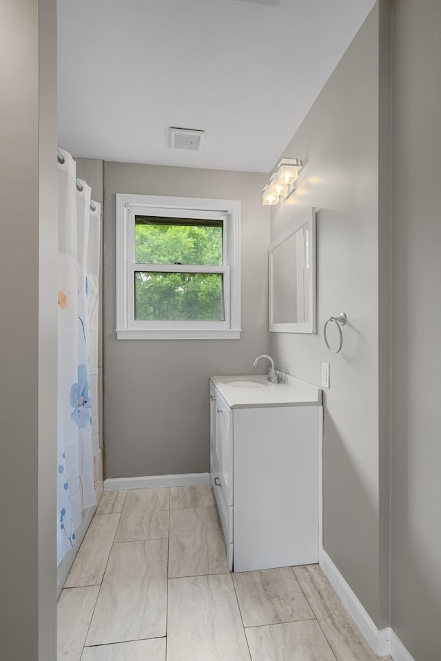 109 Hazelwood Dr, Hendersonville, TN 37075 - bathroom with vanity, baseboards, a shower with curtain, and marble look tile flooring