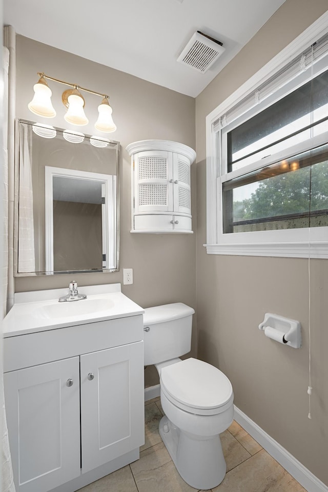 109 Hazelwood Dr, Hendersonville, TN 37075 - half bathroom featuring toilet, baseboards, vanity, and tile patterned flooring