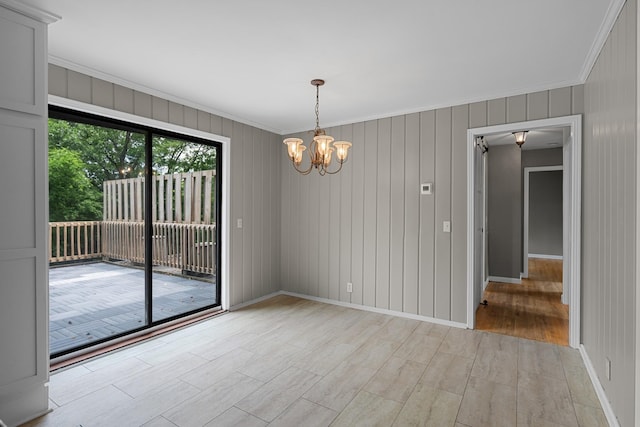 109 Hazelwood Dr, Hendersonville, TN 37075 - empty room featuring crown molding, a chandelier, light wood finished floors, and baseboards