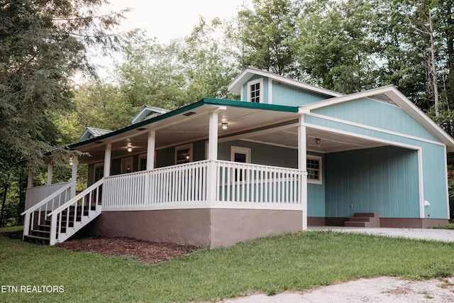 1799 Baker Hwy, Huntsville, TN 37756 - view of front of home featuring covered porch, a front yard, and stairway