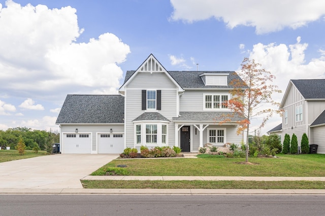 7546 Delancey Dr, College Grove, TN 37046 - view of front facade featuring a garage, concrete driveway, a front yard, and roof with shingles