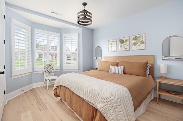 7546 Delancey Dr, College Grove, TN 37046 - bedroom featuring light wood finished floors and baseboards
