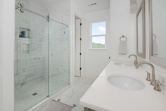 7546 Delancey Dr, College Grove, TN 37046 - full bath with a shower stall, marble finish floors, and double vanity