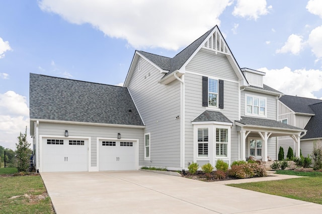 7546 Delancey Dr, College Grove, TN 37046 - view of front of property featuring driveway, an attached garage, and roof with shingles