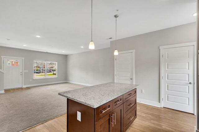 1081 Wells Way, Spring Hill, TN 37174 - kitchen with pendant lighting, baseboards, light wood-type flooring, recessed lighting, and a kitchen island