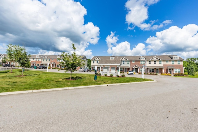 1081 Wells Way, Spring Hill, TN 37174 - view of property with a residential view, uncovered parking, and a front lawn