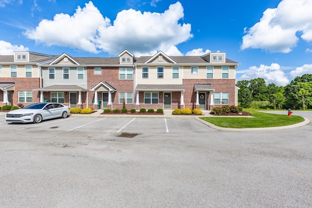 1081 Wells Way, Spring Hill, TN 37174 - townhome / multi-family property with uncovered parking and brick siding