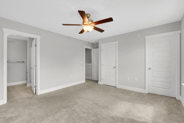 1081 Wells Way, Spring Hill, TN 37174 - unfurnished bedroom featuring light carpet, baseboards, and ensuite bath
