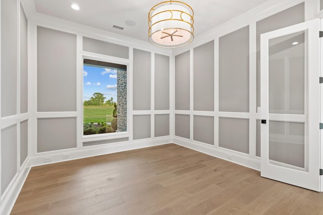 724 Bradshaw Rd, Lebanon, TN 37087 - unfurnished room featuring wood finished floors, recessed lighting, and a chandelier