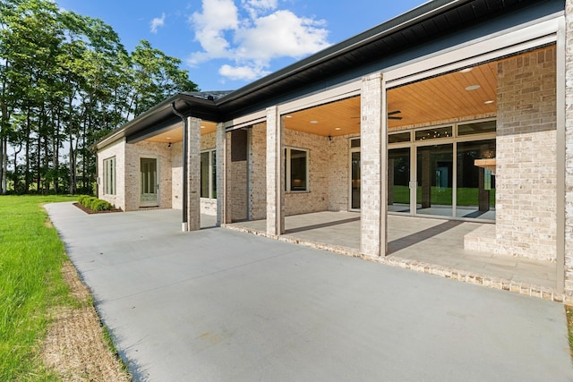 724 Bradshaw Rd, Lebanon, TN 37087 - back of house featuring a patio area and brick siding
