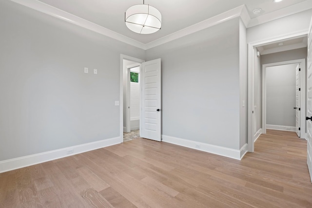 724 Bradshaw Rd, Lebanon, TN 37087 - spare room with light wood-type flooring, baseboards, and ornamental molding