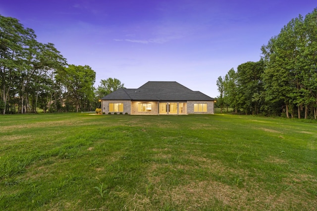 724 Bradshaw Rd, Lebanon, TN 37087 - back of property featuring a yard
