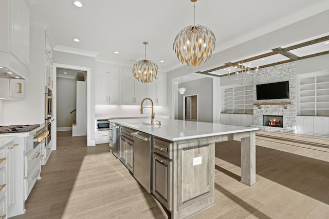 724 Bradshaw Rd, Lebanon, TN 37087 - kitchen featuring a chandelier, stainless steel appliances, a sink, light countertops, and recessed lighting