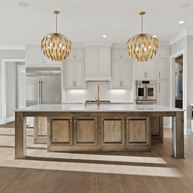 724 Bradshaw Rd, Lebanon, TN 37087 - kitchen featuring a chandelier, stainless steel built in refrigerator, light countertops, crown molding, and recessed lighting