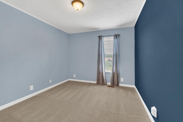 4132 Philhall Pkwy, Antioch, TN 37013 - carpeted empty room featuring crown molding, a textured ceiling, and baseboards