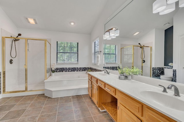 4132 Philhall Pkwy, Antioch, TN 37013 - bathroom featuring a bath, a shower stall, double vanity, tile patterned flooring, and toilet