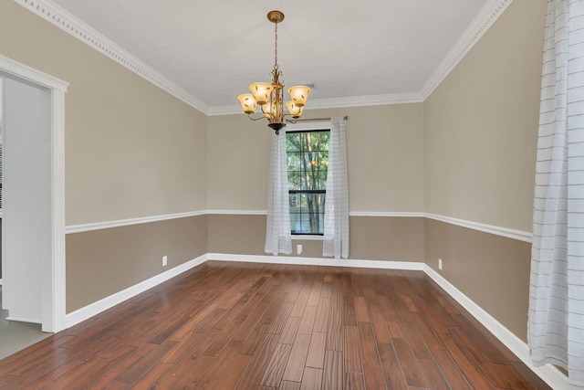 4132 Philhall Pkwy, Antioch, TN 37013 - empty room featuring a chandelier, dark wood-type flooring, baseboards, and crown molding