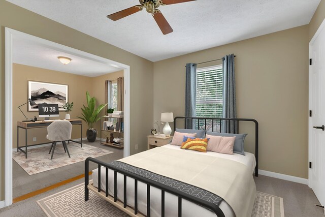 4132 Philhall Pkwy, Antioch, TN 37013 - carpeted bedroom with baseboards and a ceiling fan