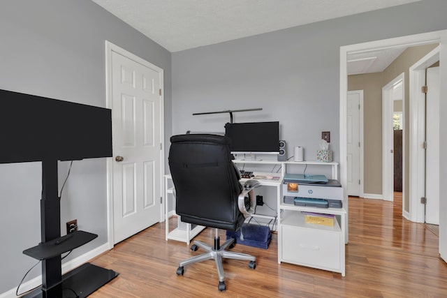 1545 Carthage Hwy, Lebanon, TN 37087 - office with light wood finished floors, baseboards, and a textured ceiling
