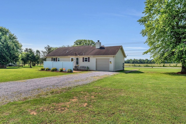 1545 Carthage Hwy, Lebanon, TN 37087 - view of front of property featuring gravel driveway, a chimney, and an attached garage